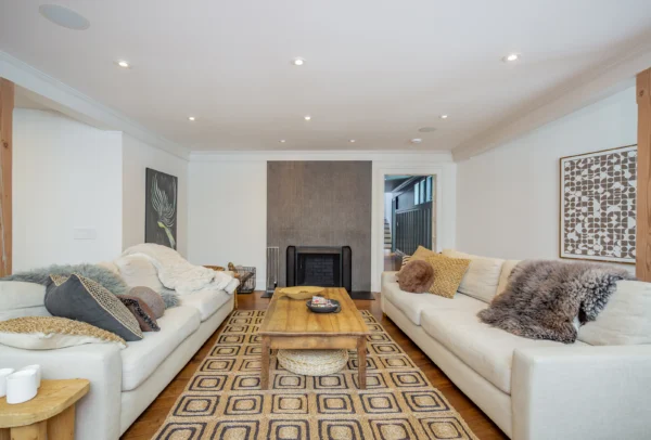East Hampton living room showing couches and fireplace